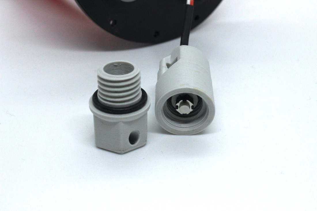 Clear dry compartment tube with electronics, battery pack, and sealed end caps